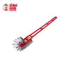 Double-sided cleaning toilet brush with plastic long handle. Household toilet toilet brush. Toilet cleaning brush without dead ends